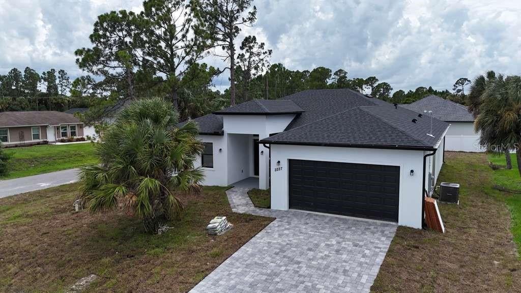 Photo of 2227 Saybrook Avenue, North Port, FL 34286 (MLS # O6423098)