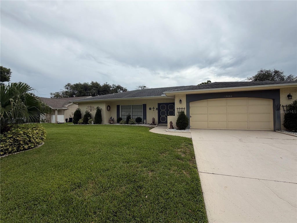 Photo of 13000 Pebble Beach Circle, Hudson, FL 34667 (MLS # W7889026)