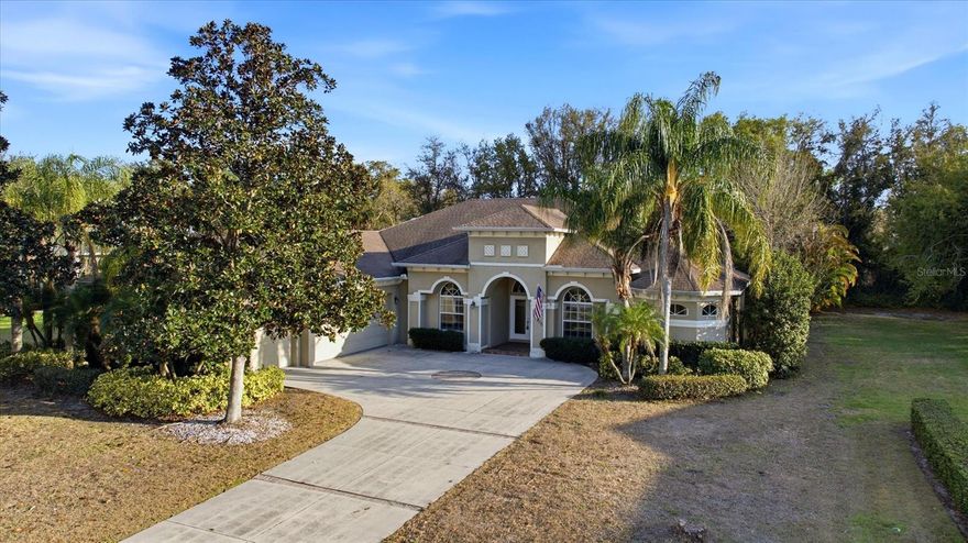 One or more photo(s) has been virtually staged. PRICE IMPROVEMENT!! Elegant executive-style home in Mill Creek offering 3,257 sq ft of living space with 4 bedrooms, 3 full baths, and a den in a desirable split floor plan. Situated on a private ½-acre lot, this home features tray ceilings, formal living and dining rooms, and a spacious family room with pocket sliders opening to the screened lanai and pool, creating seamless indoor-outdoor living.
The gourmet kitchen showcases custom cabinetry, stainless steel appliances, a large island, breakfast bar, and sunny breakfast nook. A striking disappearing corner slider enhances both the family room and the primary suite, which offers a step-up garden tub and oversized walk-in shower. Additional highlights include custom built-ins in the dining room and den, a large laundry room, and a 3-car garage. The private backyard provides a peaceful setting for relaxing or entertaining.