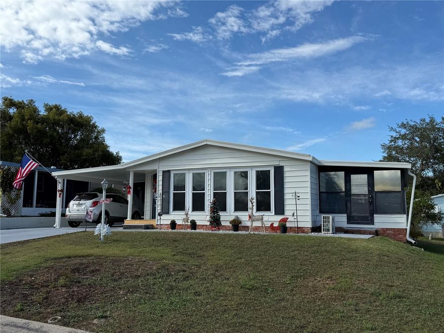 LOOKING FOR A HOME IN THE VILLAGES?  YOU HAVE GOT TO SEE THIS ONE! The seller has completely transformed this home from the ground up, inside and out, creating a beautifully enhanced 2/2 residence located in a very active village in the desirable Orange Blossom area of The Villages. This fabulous home offers an abundance of upgrades including new flooring, fresh interior and exterior paint, a new screened room, a new vapor barrier, and all-new decorative lighting throughout. The open floor plan features a walk-in pantry, a coffee bar, and a kitchen island, making the space both functional and inviting. Enjoy the huge Florida room for relaxing or entertaining, along with the utility shed that includes a new washer and dryer. The home comes fully furnished and is ready for you and your guests, offering what feels like two primary suites since each bedroom has its own private bathroom. With so many upgrades to appreciate, this home is truly a must-see—call your agent today to experience it for yourself. You will love it—make it yours today!