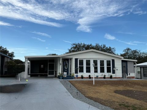 Photo of 1612 Cog Hill Drive, Lady Lake, FL 32159 (MLS # G5105260)