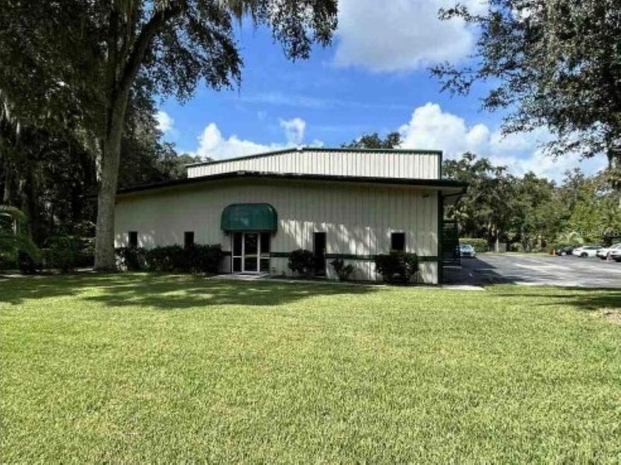Discover a versatile industrial property in Hernando County, perfectly blending functionality with room for growth. Spanning 5± acres, the site features a well-designed 12,880 SF building built in 2007 that combines warehouse and office space, providing ample room for manufacturing, logistics, or a service-based operation. The 6,560 SF warehouse area offers six 14' x 14' roll-up doors, a 28' wide x 14' high rolling door at the rear for easy loading, 20 ceiling lamps for excellent illumination, and a 6" thick cement floor, ideal for supporting heavy equipment and machinery in an industrial setting. The 26' peak ceilings provide optimal efficiency and maneuverability for large operations.

Inside, the first-floor office space includes 3,880 SF with 11 offices, a reception area, a kitchen, three bathrooms (one with a shower), and an elevator, while the second floor's 2,440 SF open space serves as a flexible training center, meeting area, or additional workspace.

The property is thoughtfully positioned with 277.2 feet of frontage on Annutalaga Ave and is visible from nearby Ponce De Leon Blvd, which sees an average daily traffic count of 4,500. Despite its accessibility, the site is tucked back amidst the trees, offering a peaceful and private setting—ideal for companies seeking a balance between visibility and a serene work environment. This property includes a versatile 20' x 40' detached utility building, along with an adjacent utility shed, offering ample space for storage and various uses. The gated entry, 6' chain-link perimeter fencing, and ample parking (41 spaces) provide convenience and security.

Located in the growing community of Hernando County, this property sits in a region known for its business-friendly atmosphere, abundant workforce, and expanding infrastructure. With industrial zoning (PDP with C4 use), the space is ready for a variety of uses such as light manufacturing, distribution, storage, or corporate headquarters. The expansive 5± acre lot provides plenty of room for future expansion, allowing businesses to grow and adapt over time.

Whether you're looking to establish a new headquarters, relocate your operations, or expand your footprint, this property offers a strategic and versatile opportunity for your business.
