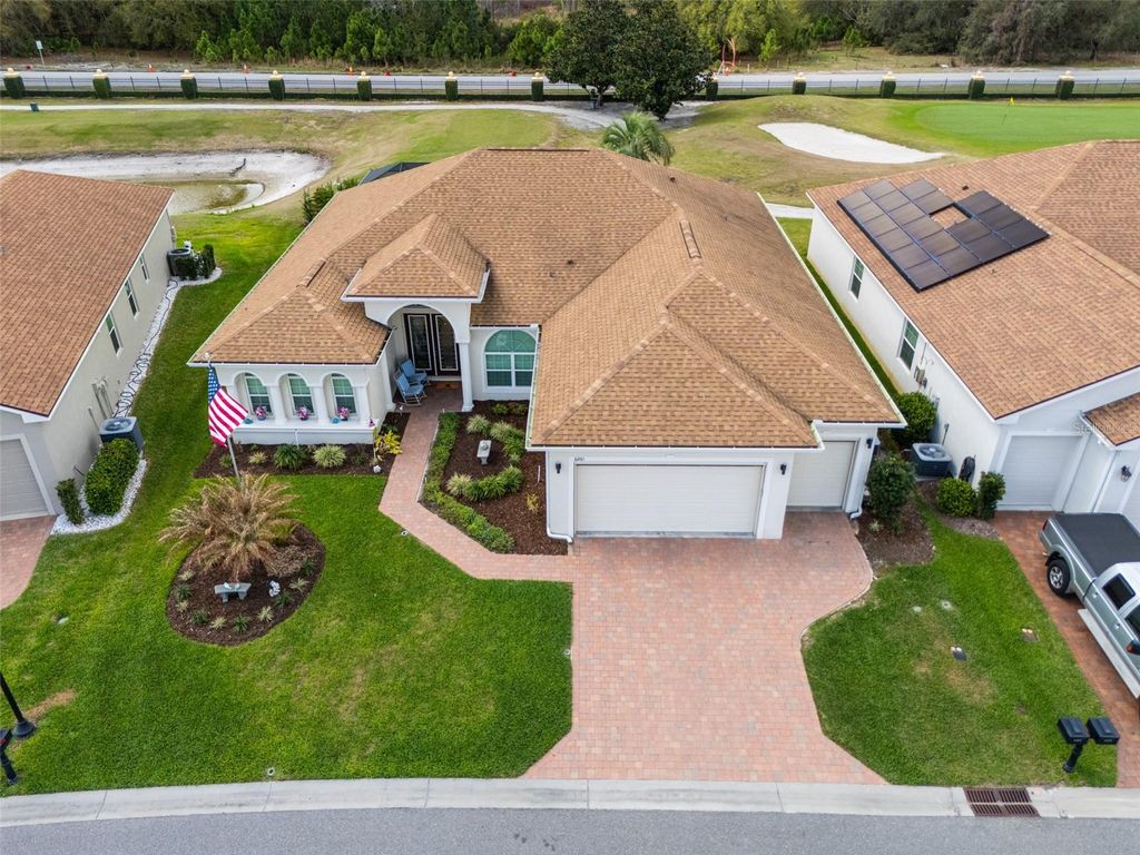 Photo of 6261 Pinehurst Loop, Winter Haven, FL 33884 (MLS # L4959857)