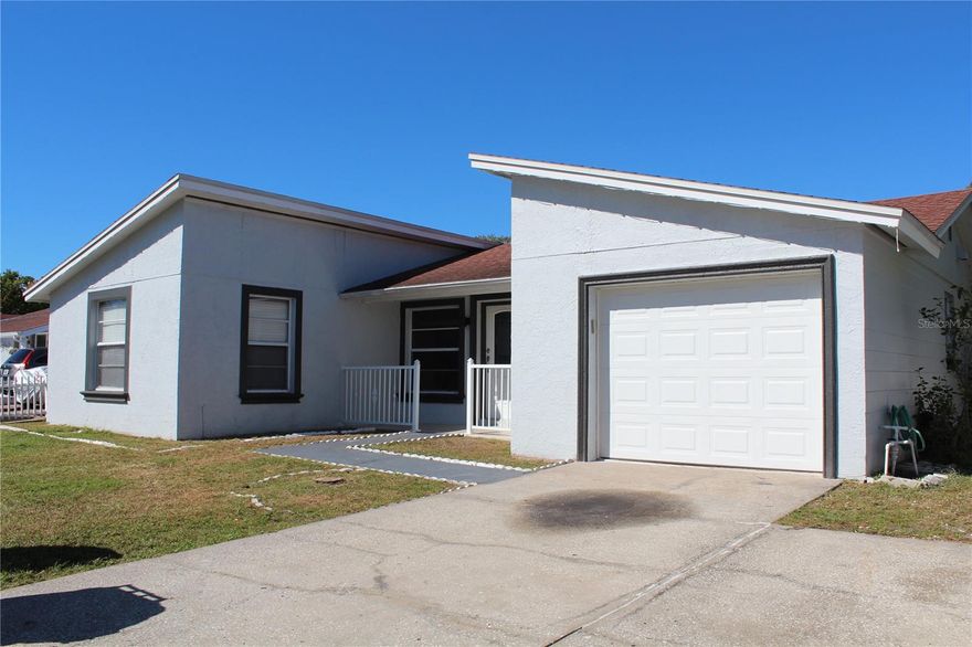 Updated 2/2/1 with a fenced in back yard on a cul de sac. Great floorplan. Must see.  Washer and Dryer included but not warranted.  Schedule an appointment today.  Easy access to everything that you need.  Stores, libraries, Veterans Express Way, I275, Tampa International Airport.