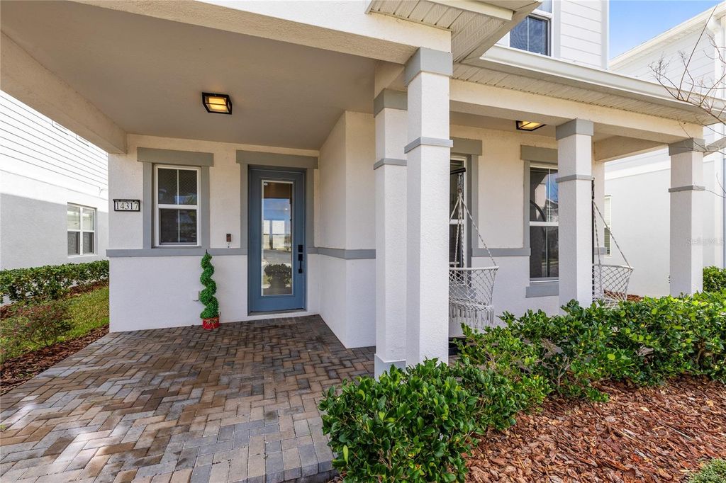 Photo of 14317 Lanikai Beach Drive, Orlando, FL 32827 (MLS # O6388459)