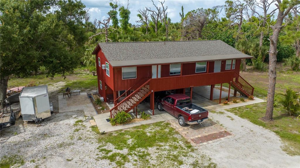 Photo of 7500 Beckers Lane, Englewood, FL 34224 (MLS # D6140662)