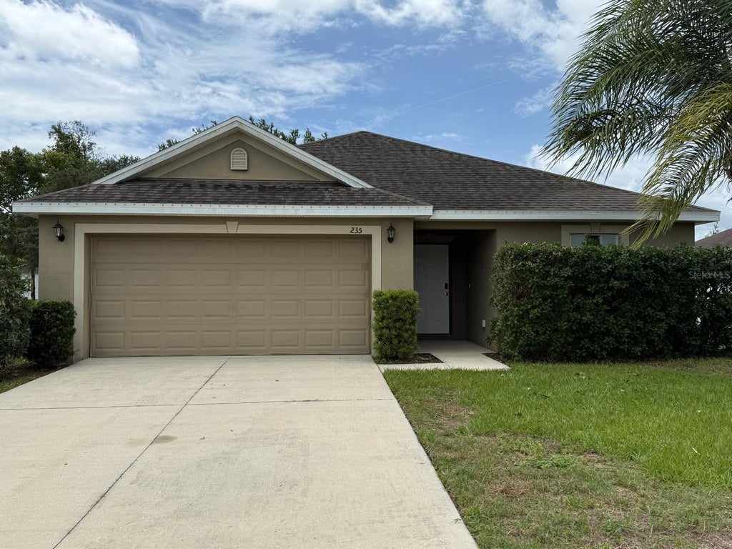 Photo of 235 Eleuthera Drive, Lake Alfred, FL 33850 (MLS # O6412744)