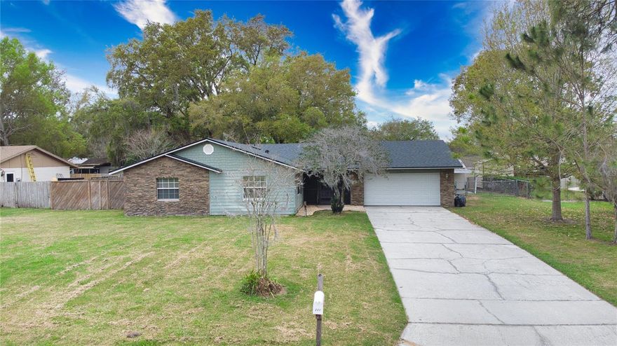 Welcome to your new home located minutes from the West Orange Bike Trail and historic downtown Winter Garden. This home has community access to Lake Apopka. This block construction home, accented with stone and siding, sits on an oversized lot with mature landscaping on a tree-lined cul-de-sac. Home features 4 bedrooms and 2 baths a separate dining room, living room, sun room, indoor utility room with direct access to backyard, a large pantry off the kitchen, a large linen closet. It has a two-car garage, utility shed, brick patio in the backyard and screened front porch. The kitchen has access to the large enclosed air conditioned sun room that is pre-wired for surround sound.