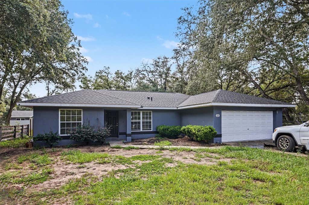 Photo of 135 Fisher Way Trail, Ocklawaha, FL 32179 (MLS # O6432390)