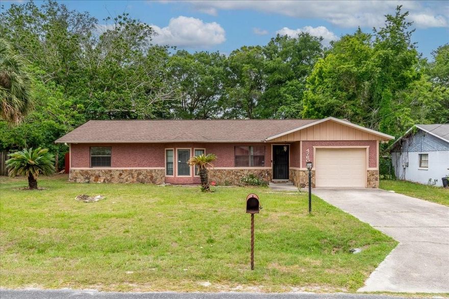 WELCOME HOME TO 49TH STREET VILLAGE. THIS 3/2/1 IS LOCATED IN A SINGLE STREET COMMUNITY WITH A CUL-DE-SAC AND NO THRU TRAFFIC. THIS HOME FEATURES VAULTED CEILINGS, SKYLIGHTS AND A WOOD BURNING FIREPLACE IN THE LIVING ROOM. THE PRIMARY OFFERS A  BAY WINDOW AND AN EN SUITE WITH A JETTED TUB AND A WALK IN CLOSET. INSIDE LAUNDRY ROOM/PANTRY JUST OFF THE KITCHEN. OUTSIDE ENJOY THE SCREENED PATIO AND A LARGE FENCED BACKYARD. ENJOY PEACE OF MIND KNOWING THE OWNERS HAVE UPDATED: STOVE 2026, REPLACED ELECTRICAL PANEL AND UPDATED GUEST BATH 2024, REPLACED AC AND ROOF 2022 AND REPLACED THE WATER HEATER IN 2015.