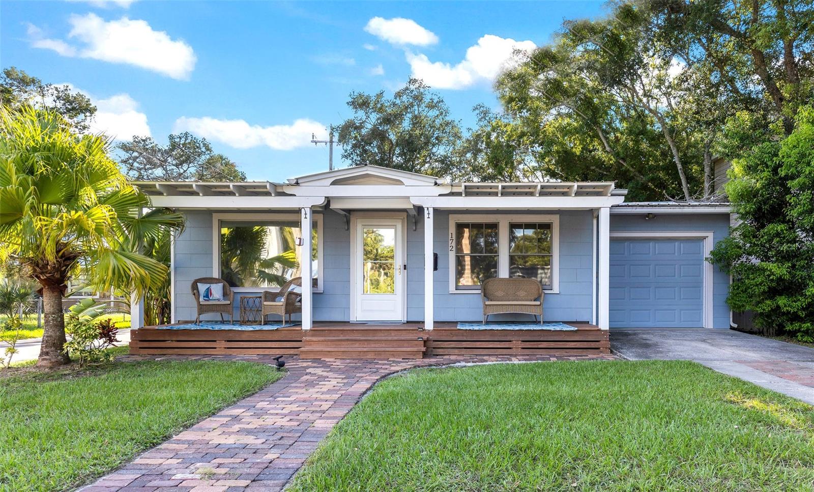 Welcome to this beautifully renovated Lincolnville cottage, where historic charm meets modern peace of mind. This fully furnished 2-bed, 1-bath home has been thoughtfully updated and is ready to serve as a primary residence, vacation retreat, or income-generating short-term rental. The inviting covered front porch (with gutters) sets the stage for morning coffee or evening conversation while keeping deliveries dry. Step inside to an open, light-filled living space and a chef-inspired kitchen boasting quartz countertops, soft-close cabinetry, farmhouse sink, custom pantry, and stainless-steel appliances including a French-door refrigerator, Fisher Paykel dishwasher drawer, and air-fryer range. The split bedroom layout offers privacy, while the stylish bath features granite finishes, a custom glass barn-door shower, and preserved Carrara marble flooring. Recent upgrades provide comfort and confidence: a durable metal roof with more than 27 years of life remaining, 200-amp electrical panel (2021), HVAC (2016), full plumbing re-pipe, water heater (2021), and a newly built front porch with gutters. Inside and out, every major component has been cared for. The oversized one-car garage includes laundry, water softener, and room for storage or larger vehicles. A newly built 8x12 powered shed expands the possibilities, ideal as a home office, creative studio, or guest overflow. Entertain outdoors on the back deck overlooking the spacious fenced yard with fire-pit. Zoned RS-2, this home offers flexibility for its next owner. Beyond the property, you’re immersed in the best of St. Augustine—the nation’s oldest city. Walk to historic downtown shops, restaurants, and cultural sites, or enjoy nearby parks, trails, and the community recreation center with pool, playground, and ball fields. Freedom Park, just blocks away, offers 10+ acres of green space along the San Sebastian River with picnic areas and a meditation garden. From history and culture to convenience and modern updates, this Lincolnville gem captures it all. All information provided is deemed reliable but not guaranteed.