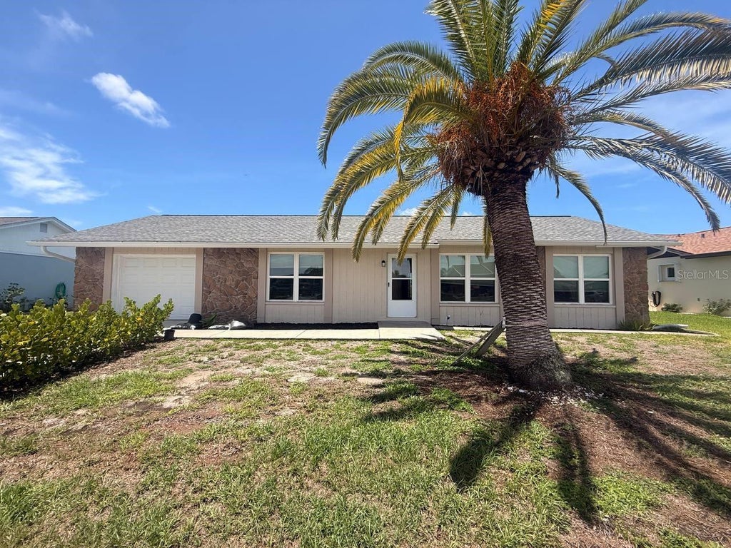 Photo of 13569 Overton Avenue, Port Charlotte, FL 33981 (MLS # O6423929)