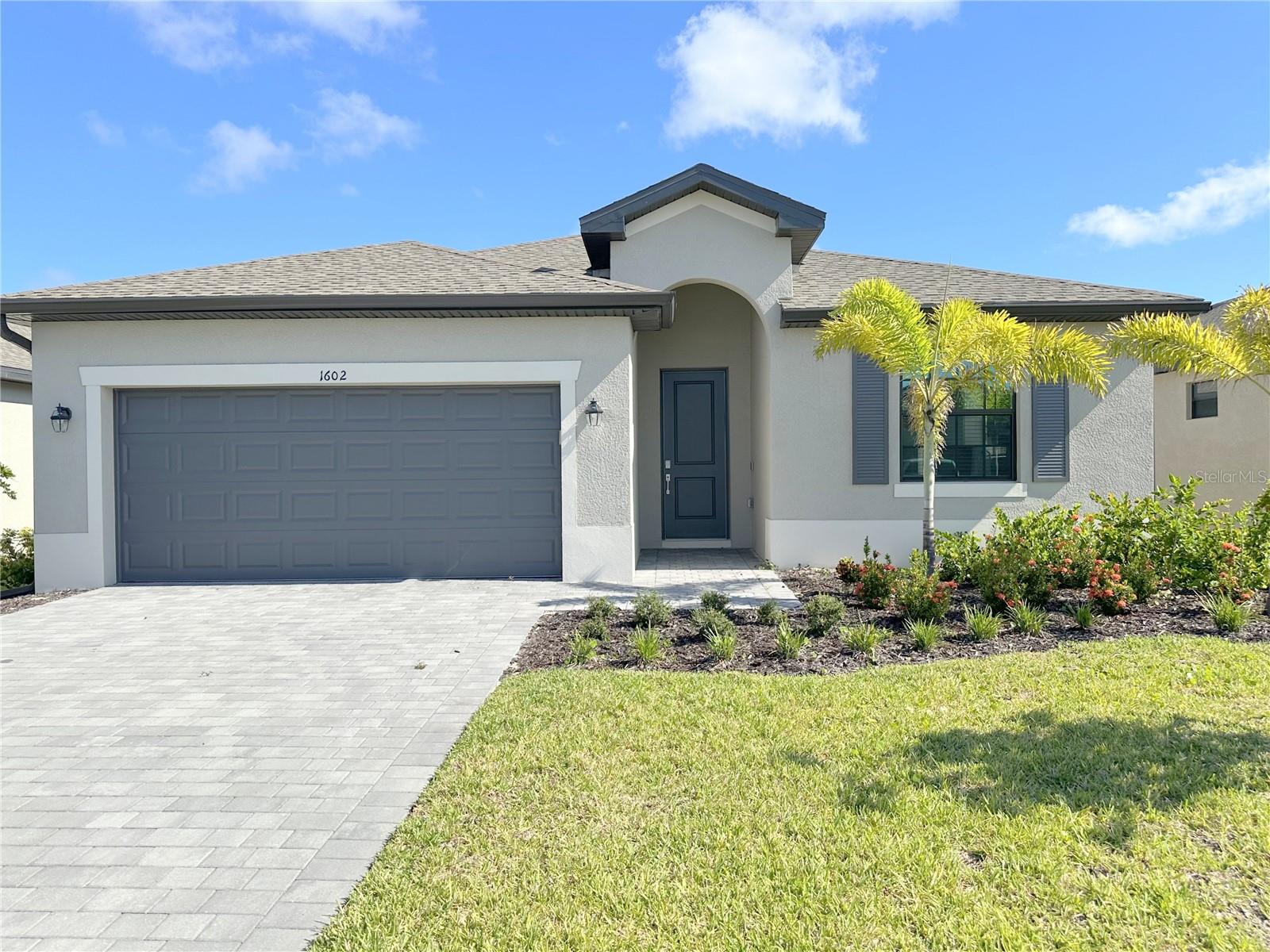 ANNUAL RENTAL AVAILABLE! Welcome to Biscayne Landing located in Port Charlotte, Fl, a gated community. This never been lived in, new built, move in ready home has 3 bedrooms, 2 bathrooms, open floor plan, 2 car garage, with just over 1600 square feet of living space. Be the first to call this single-family residence home. Tile flooring throughout which is great for the Florida lifestyle. The kitchen is equipped with stone countertops and all brand-new stainless steel kitchen appliances which include refrigerator, dishwasher, range, and OTR (microwave). The kitchen cabinets are equipped with pull-out trash bins, as well as pull-out cabinet shelves for ease access. Both bathroom vanities also have upgraded granite countertops. The primary bathroom has double vanity sink and a large walk-in shower. The primary bedroom is large enough for a king-size bed and has a nice walk-in closet for storage. The windows and doors are storm-protected as well as the garage door being steel-reinforced. The community has amenities for all to enjoy! Community pool, pickle ball courts, and a fitness room! Location is a plus as well. Located only minutes away from beaches, restaurants, shopping, local parks, you won't have any problem finding something to do locally! If you are a baseball fan, you'll love the ease of access to both the Charlotte Sports Park and CoolToday Park in North Port, which host both MLB teams during spring training. Don't let this home slip by. Call for your private showing! $70 application/adult required. Must allow 15 days for lease approval by HOA.
