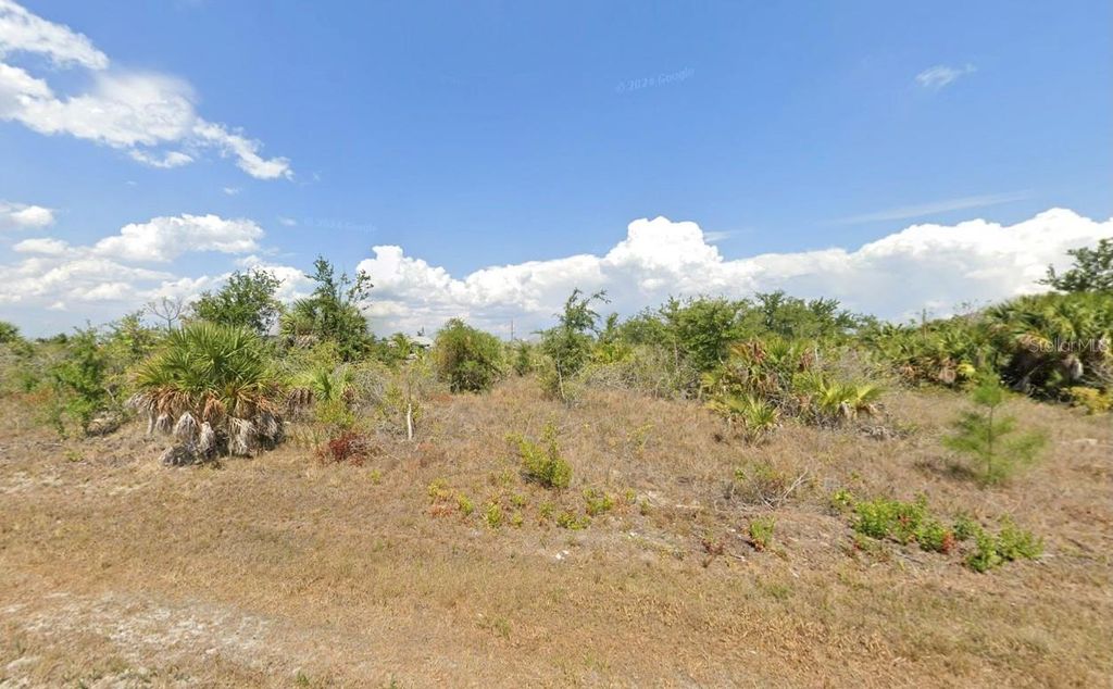 Photo of 9198 Key West Street, Port Charlotte, FL 33981 (MLS # C7515336)