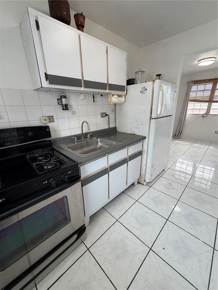 Photo of 263 Alturas De Campo Rico, Canovanas, PR 00729 (MLS # PR9123395)