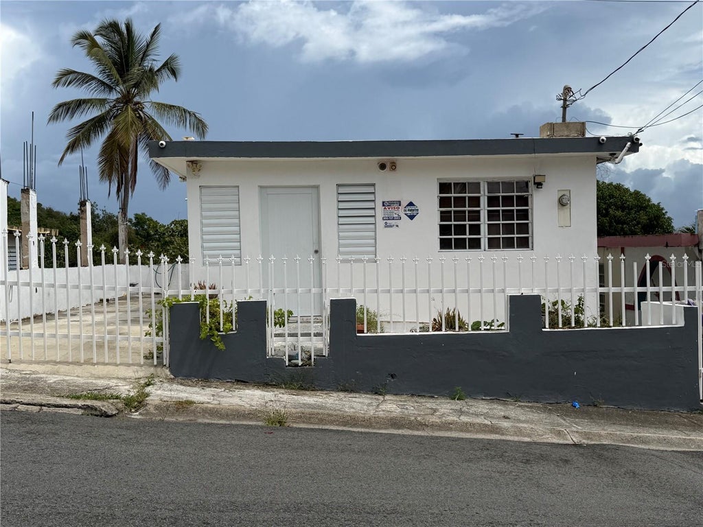 Photo of 263 Alturas De Campo Rico, Canovanas, PR 00729 (MLS # PR9123395)