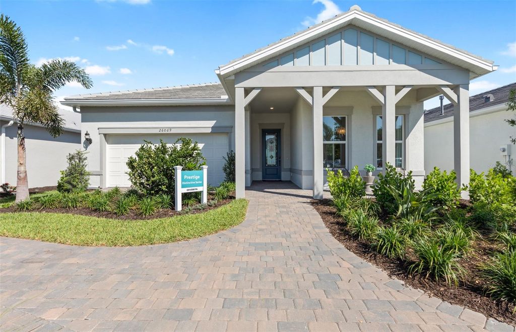 Photo of 26700 Sandy Breeze Drive, Englewood, FL 34223 (MLS # TB8486802)