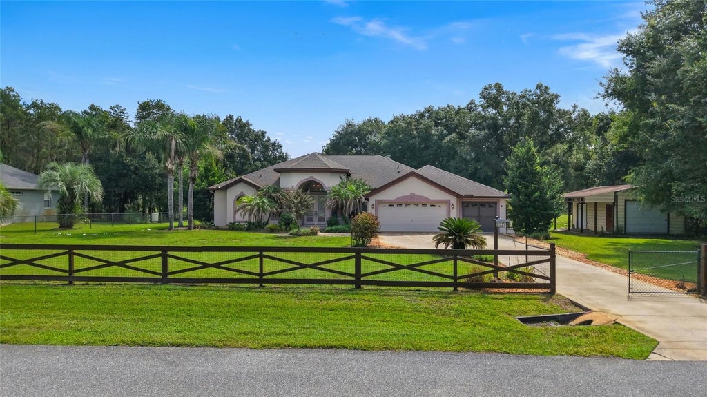Photo of 7716 Pine Lands Drive, Wesley Chapel, FL 33544 (MLS # TB8543897)