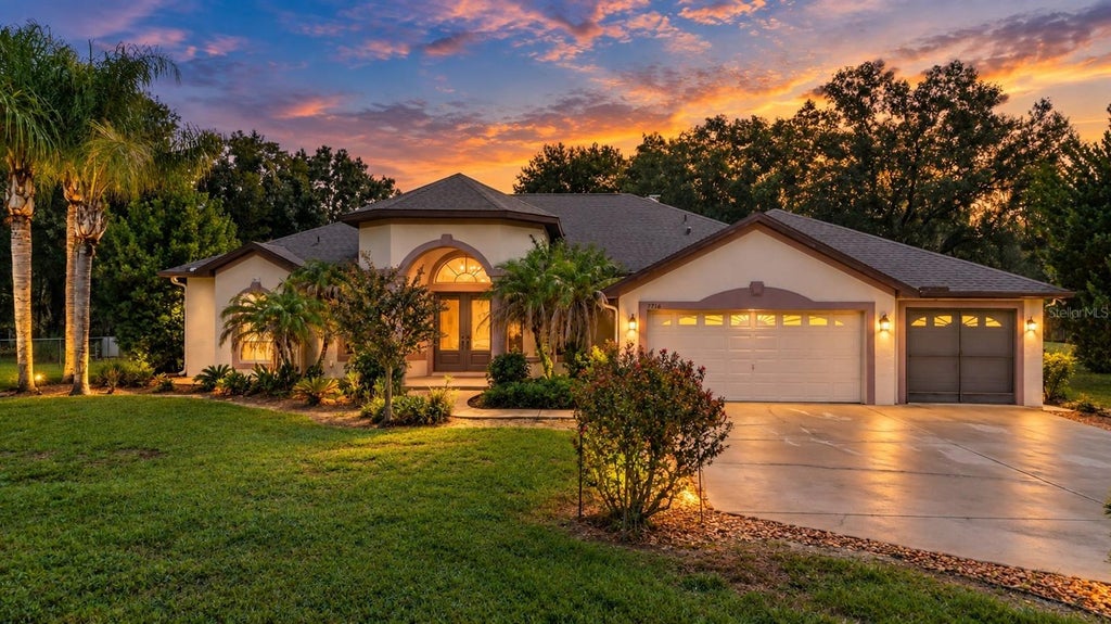 Photo of 7716 Pine Lands Drive, Wesley Chapel, FL 33544 (MLS # TB8543897)