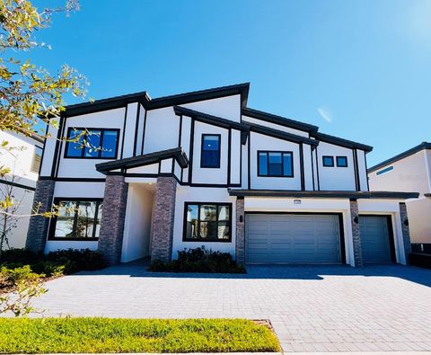 Photo of 11037 Moray Bay Avenue, Orlando, FL 32821 (MLS # O6362393)