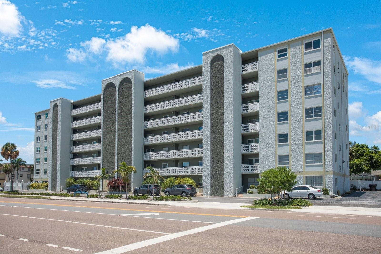 Large top floor 2 bedroom 2 bathroom condo ready for your own personal touches. Unit has lots of natural light and all windows are updated and Ac unit is newer just needs some TLC and you will enjoy this unit for many years. The heated pool area has access to a grill, shaded area, recreation room, fitness center and kitchen. Condo fee $612, which includes water, sewer, trash, internet, and cable. Unit may be used as a rental after 1 year of ownership. Sold "AS IS". The Milestone Inspections have been completed, and there are no required repairs. Centrally located to St. Pete, Treasure Island, shopping, and 2 miles to the beach, and close to the intracoastal waterway.