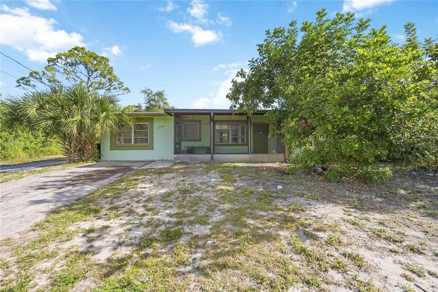 Experience the comfort and charm of Florida living in this warm and inviting home with thoughtful updates throughout. The main home features 2 bedrooms, 2 bathrooms, and a spacious open living and dining area, creating a comfortable layout for everyday living or entertaining. The house features a private mother-in-law suite with a separate entrance, complete with its own room, bathroom, kitchen, and new refrigerator—ideal for extended family, guests, or rental. Appliances are included:  2 fridge,  1 stove, 1 cooktop, 2 washing machines, and a dryer. Large backyard with a view of a small canal and greenery. Three separate entrances to the house. The house needs some TLC but major updates include: New flat roof (December 2022), New A/C system (approx. 2023) Updated bathrooms (2020). Conveniently located close to highways, shopping, dining, and a few minutes' drive to Warm Mineral Springs Park, known for its naturally warm mineral waters. Schedule your showing today!