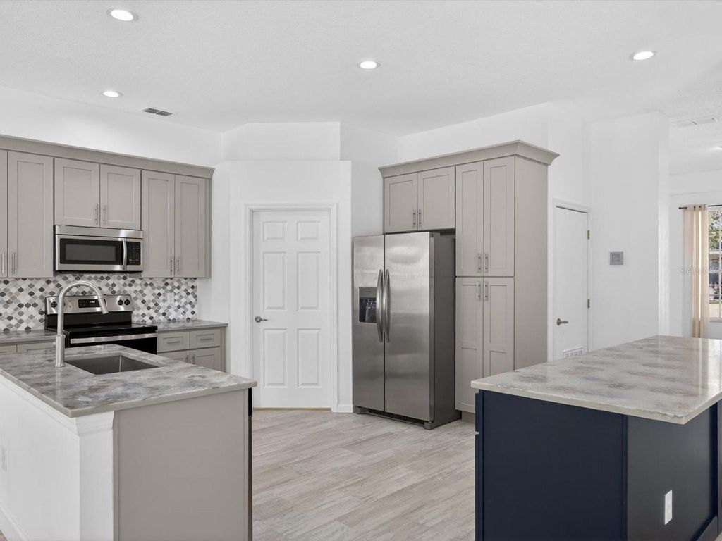 Photo of 411 Boxwood Drive, Davenport, FL 33837 (MLS # O6375912)