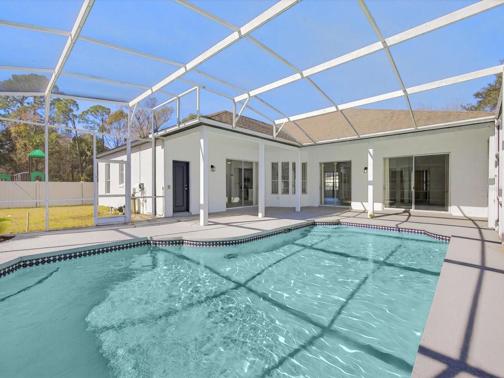 Photo of 411 Boxwood Drive, Davenport, FL 33837 (MLS # O6375912)