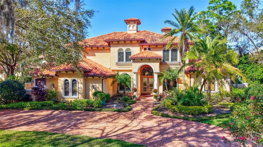 Possibly one of the BEST streets in the A+++ community of AVILA, premier 24-hour gated golf and country club community in Tampa.  Tranquil street with only a handful of homes near the cul-de-sac offers its residents a safe and peaceful lifestyle.  The home itself is ABSOLUTELY AMAZING!  Built by the high-end custom builder Campagna Homes, no detail was overlooked in this home. 4-car garage with lots of extra space for additional cars in the courtyard and also on the oversized circular driveway adds so much functionality. The most grand foyer with high ceilings, amazing iron-cast staircase, the green outdoors and pool area that you see immediately upon your entrance, the most beautiful and elegant area around the fireplace - you immediately feel it must be something special.  Primary bedroom DOWNSTAIRS, completely away from all other bedrooms. Smart and extremely well thought-out floor plan offers all the right rooms and spaces.  Office near the primary bedroom, so many amazing areas for family gatherings and entertainment of guests.  It is spacious, light and bright. AN OFFICE in front of the house, away from other more busy areas, so you can attend to your business without distractions. COMPLETELY remodeled kitchen, featuring contemporary cabinetry and island with the accent color. Everything is so elegant and tasteful.  On the other side, you will find the coffee nook with your favorite mugs and coffee equipment for your morning coffee indulgence.  Thermador appliances.  2 built-in refrigerators, 6-burner range, double-oven, lots of cabinet space and a walk-in pantry.  The butler pantry is nestled between the kitchen and the dining room. On the other side of the kitchen you will find the billiard room, with the wet bar and a powder room.  Theater room fully equipped with the projector and theater-seating.  There are 3 fireplaces in this home – in the living room, primary bedroom, and another one between the family room and the billiard room.  All other bedrooms (3) are located on the second floor.  One with the en-suite bath and 2 others sharing a Jack-and-Jill bathroom. The bonus room nearby is a great space and offers so many possibilities!!! A great space that can be a yoga room, a play room, another TV room!  YOUR TEENAGERS will never want to leave the house - this is such a great gathering space!  YES, this home offers it all.  SO MANY possibilities! INCREDIBLE serene and private outdoor oasis awaits outside. Outdoor kitchen, covered and open areas.  Large fenced-in yard. Come, fall in love, make it your home…