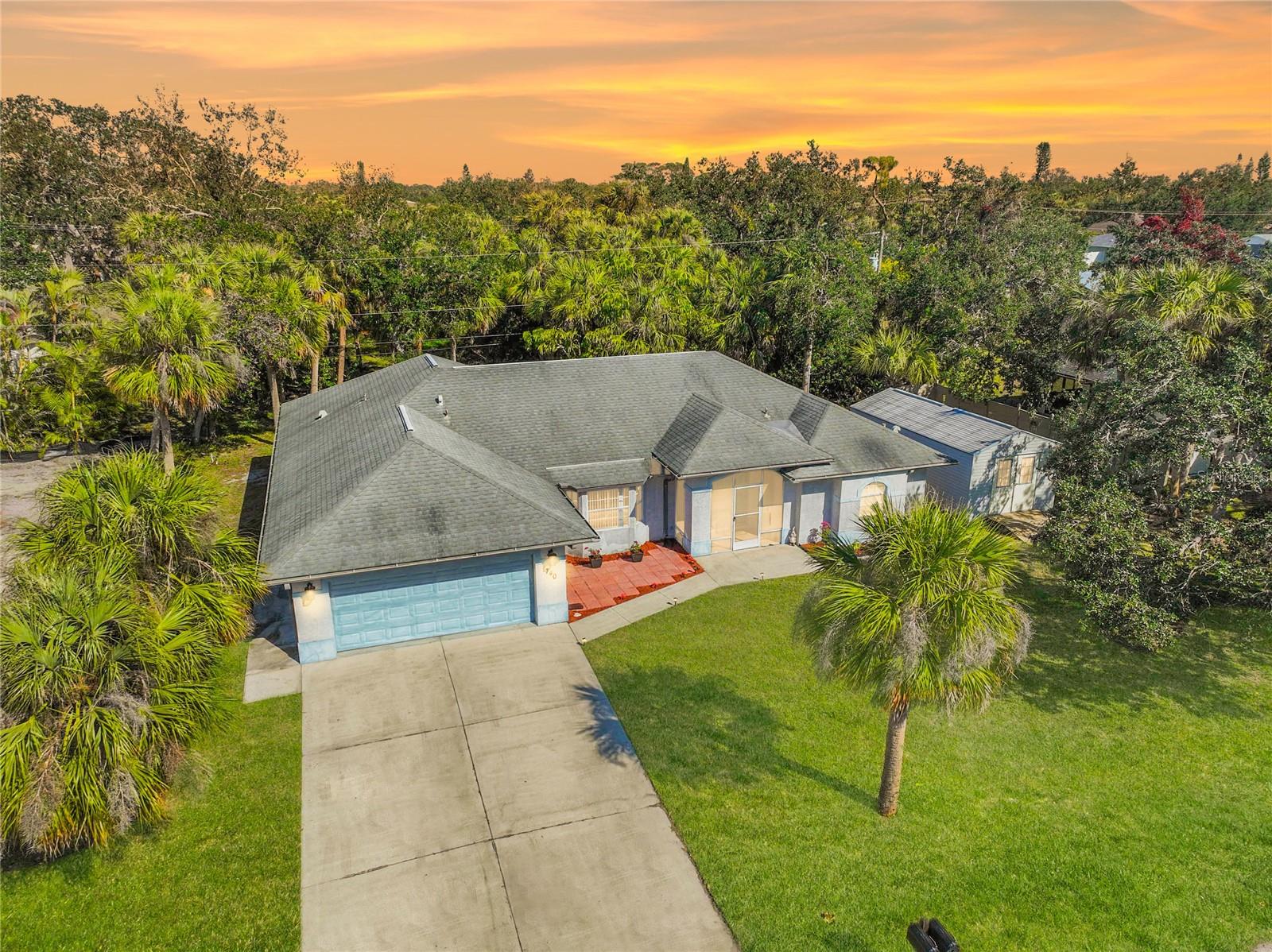 BACK ON MARKET WITH A New and Improved Price! Welcome to your Florida oasis—where charm, comfort, and an unbeatable location come together! Perfectly situated near the stunning Gulf Coast beaches and vibrant local attractions, this delightful home offers a relaxed and flexible lifestyle you’ll love coming home to. As you step inside, you're welcomed by a cozy sitting room that sets the tone with warmth and character. Just beyond, a full-sized dining room provides the perfect setting for everything from intimate dinners to lively gatherings with friends and family. The galley-style kitchen is a chef’s dream, offering abundant storage and an extended peninsula that opens to the spacious family room—creating a seamless flow for entertaining. French doors lead from the family room to a screened-in patio and lush backyard, inviting you to embrace Florida’s signature indoor-outdoor lifestyle. Thoughtfully designed with privacy in mind, the split floor plan features a spacious primary suite with two walk-in closets, French doors to the outdoor living space, and a spa-like en-suite bathroom complete with a large marble soaking tub, separate shower, split vanities, and generous storage. One of the home’s standout features is the outdoor workshop—cleverly disguised as a shed! Fully equipped with electricity and air conditioning, it’s ready to become your personal retreat, whether as a she-shed, man cave, creative studio, or fully functional workshop. Ideally located, you’re just minutes from Manasota Beach, a short drive to Venice Beach—famous for shark tooth hunting—and an easy trip to the world-renowned sands of Siesta Key Beach. You’ll also enjoy quick access to shopping, dining, and cultural highlights including Historic Downtown Venice, Englewood’s Historic Dearborn Street, and the exciting new Wellen Park development. Sports fans will love being close to CoolToday Park, the Spring Training home of the Atlanta Braves. Don’t miss your chance to own this rare gem that offers both freedom and flexibility in one of Florida’s most desirable areas! ¤ Please see 3D Tour and Video ¤