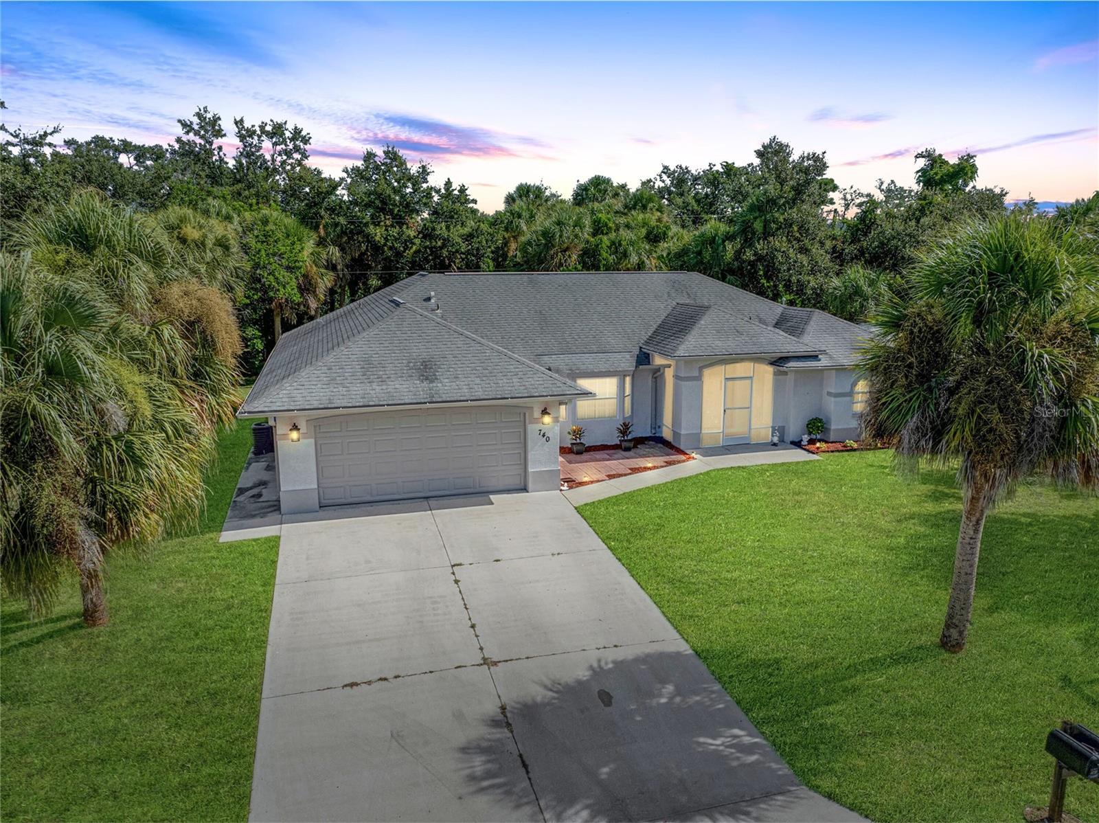 BACK ON MARKET WITH A New and Improved Price! Welcome to your Florida oasis—where charm, comfort, and an unbeatable location come together! Perfectly situated near the stunning Gulf Coast beaches and vibrant local attractions, this delightful home offers a relaxed and flexible lifestyle you’ll love coming home to. As you step inside, you're welcomed by a cozy sitting room that sets the tone with warmth and character. Just beyond, a full-sized dining room provides the perfect setting for everything from intimate dinners to lively gatherings with friends and family. The galley-style kitchen is a chef’s dream, offering abundant storage and an extended peninsula that opens to the spacious family room—creating a seamless flow for entertaining. French doors lead from the family room to a screened-in patio and lush backyard, inviting you to embrace Florida’s signature indoor-outdoor lifestyle. Thoughtfully designed with privacy in mind, the split floor plan features a spacious primary suite with two walk-in closets, French doors to the outdoor living space, and a spa-like en-suite bathroom complete with a large marble soaking tub, separate shower, split vanities, and generous storage. One of the home’s standout features is the outdoor workshop—cleverly disguised as a shed! Fully equipped with electricity and air conditioning, it’s ready to become your personal retreat, whether as a she-shed, man cave, creative studio, or fully functional workshop. Ideally located, you’re just minutes from Manasota Beach, a short drive to Venice Beach—famous for shark tooth hunting—and an easy trip to the world-renowned sands of Siesta Key Beach. You’ll also enjoy quick access to shopping, dining, and cultural highlights including Historic Downtown Venice, Englewood’s Historic Dearborn Street, and the exciting new Wellen Park development. Sports fans will love being close to CoolToday Park, the Spring Training home of the Atlanta Braves. Don’t miss your chance to own this rare gem that offers both freedom and flexibility in one of Florida’s most desirable areas! ¤ Please see 3D Tour and Video ¤