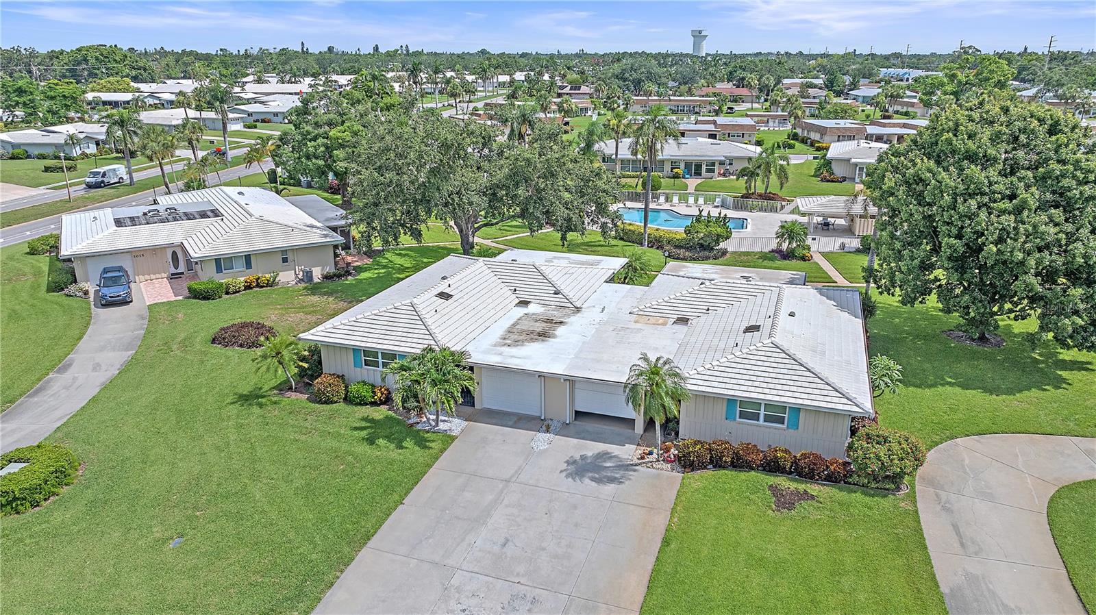 Auction Property. Online Auction 8/6 6:00 PM - This turn-key 2-bedroom, 2-bathroom condo offers simple, modern living with a practical layout. Designed for comfort and convenience, it features an open-concept kitchen, dining, and living area as well as enclosed lanai overlooking the community pool. The master suite includes a private bathroom and ample closet space, second bedroom, full bath, and laundry room finish out the living area. A one car garage provides parking and extra storage space. Conveniently located on 4 miles to the beach and close to all necessities as well as GT Bray Park and Robinson Preserve for outdoor adventures. The condo also comes with all normal condominium amenities including a large community pool. This home has been meticulously cared for, renovated, and is in move-in ready condition. Don't miss out on this opportunity! Sellers will entertain pre-auction offers. 55+ Community. No rentals. No pets.