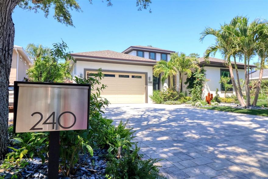 Location! Location! Location!  Absolutely stunning 4 year old custom-built pool home in the desirable Shore Crest golf cart neighborhood.  This immaculate home has every conceivable upgrade imaginable.  The stunning impact rear french doors open to the pool deck that is an entertainers delight with a massive outdoor kitchen and counter seating for 10 people.  The yard is a gardeners dream with a large garden shed, a zen garden and many native plants and flowers attracting butterflies and bird life.  It is very rare that a home of this calibre comes onto the market.  This home's block construction, whole house generator, hurricane windows, 8 ft interior doors, high ceilings, glass surround office, exceptional kitchen and a spacious 2 car garage are only some of the magnificent features of this stunning home.  This is the quintessential Florida lifestyle home.