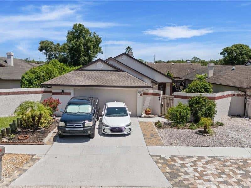 Photo of 10903 Landon Lane, Tampa, FL 33635 (MLS # TB8531491)