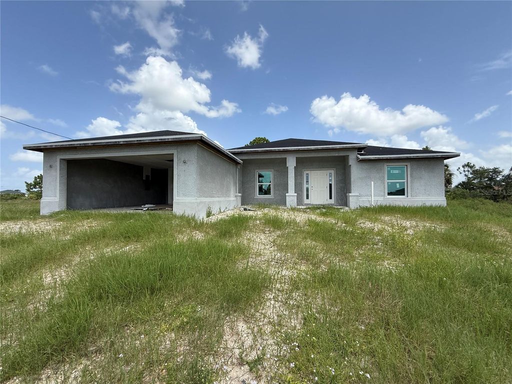 Photo of 1017 NE 44th Street, Cape Coral, FL 33909 (MLS # A4660162)