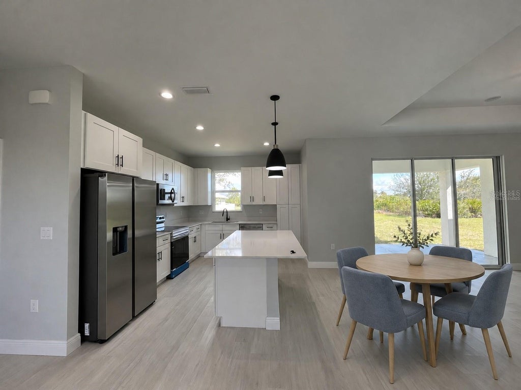 Photo of 13335 Holtville Avenue, Port Charlotte, FL 33981 (MLS # S5154628)