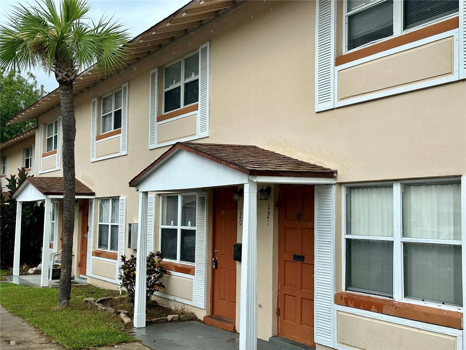 MOVE-IN READY!!! Beautiful Townhome 2 bedrooms, 1 ½ bathrooms. Ceramic Tile downstairs. New vinyl flooring upstairs. The well-appointed kitchen is a chef's delight, boasting newer appliances that make cooking a joy. The adjacent dining room opens up to a nice patio deck, perfect for al fresco dining or simply enjoying the Florida sunshine and fresh air. Upstairs, you'll find both bedrooms adorned with warm wood laminate flooring and enhanced by the gentle circulation of ceiling fans. The layout provides privacy and functionality, with a full bathroom serving both bedrooms. The location of River-Golf Townhouses adds an extra layer of appeal. Situated just two blocks from the river, residents can enjoy serene strolls along the waterfront. Plus, with the beach a mere 5-minute drive away, you'll have the luxury of coastal living at your fingertips. Don’t miss this opportunity… Schedule a showing today!!!
