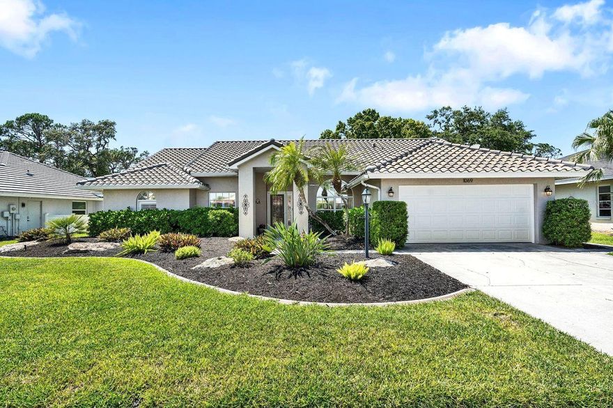 Now available in the desirable community of Laurel Woodlands is a custom 3-bedroom, 2-bathroom furnished pool home with over 2000 square feet of beautiful living space. The pleasing curb appeal and entry welcome you into the foyer where you’ll experience an instant feeling of spaciousness with skylights and lofty cathedral ceilings. Enjoy the benefit of a flexible floor plan with multiple living and dining spaces to suit your lifestyle. The gorgeous natural stone fireplace is the highlight of the family room and within view of the large open kitchen. The generous kitchen island accommodates many and prep space and cabinetry are plentiful. Updated stainless appliances and a breakfast nook with views out to the lanai serves chefs and guests well. A formal dining room supports more upscale occasions and the separate living room provides yet another gathering space. French doors lead to a dedicated office with convenient built-ins for organized storage. An impressive primary suite not only has a bathroom with soaking tub and shower but a separate sitting area overlooking the lanai for enjoying morning coffee or quiet afternoons with a good book. There's room for guests plus privacy with the split bedroom plan and two well-appointed bedrooms both with walk in closets. Step outside to your own private and peaceful paradise with lush tropical landscaping in the sizeable backyard. The main event here is your sparkling heated pool with covered outdoor entertaining area, direct access to the hall bathroom, classic travertine pool deck and large screened lanai cage installed in 2022. Other important updates include garage door, irrigation control panel and well pump, refrigerator, AC system, pool filter and pump plus in 2022 a new tile roof. This quiet neighborhood has a fantastic location with access to several area beaches, waterfront dining, quaint downtown Venice shopping, good schools, quality medical services and I-75. Schedule a private showing to see this incredible property!