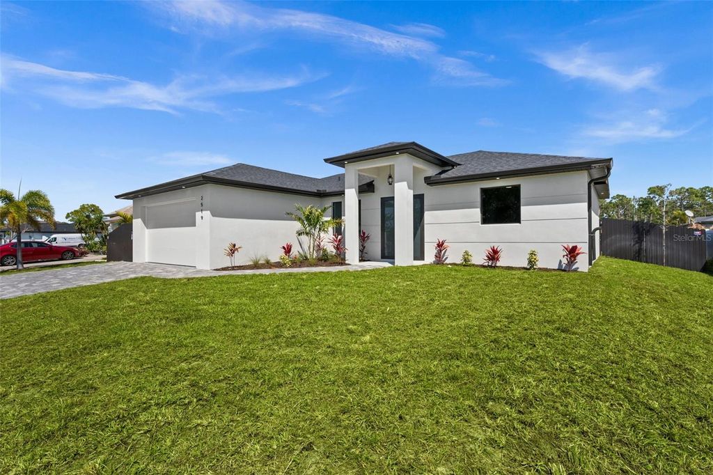 Photo of 2519 NW 18th Place, Cape Coral, FL 33993 (MLS # TB8498421)