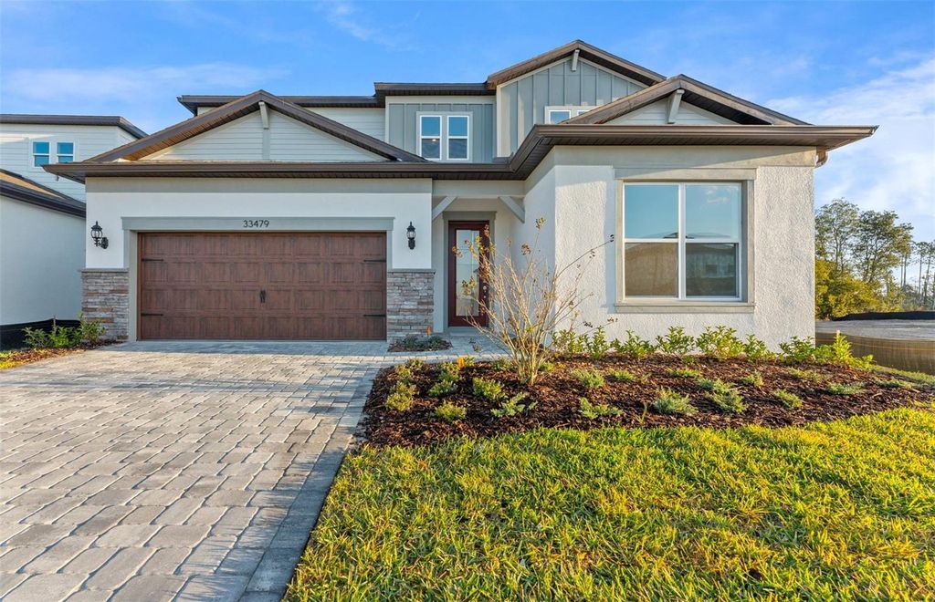 Photo of 33479 Barnebrook Drive, Wesley Chapel, FL 33545 (MLS # TB8421840)