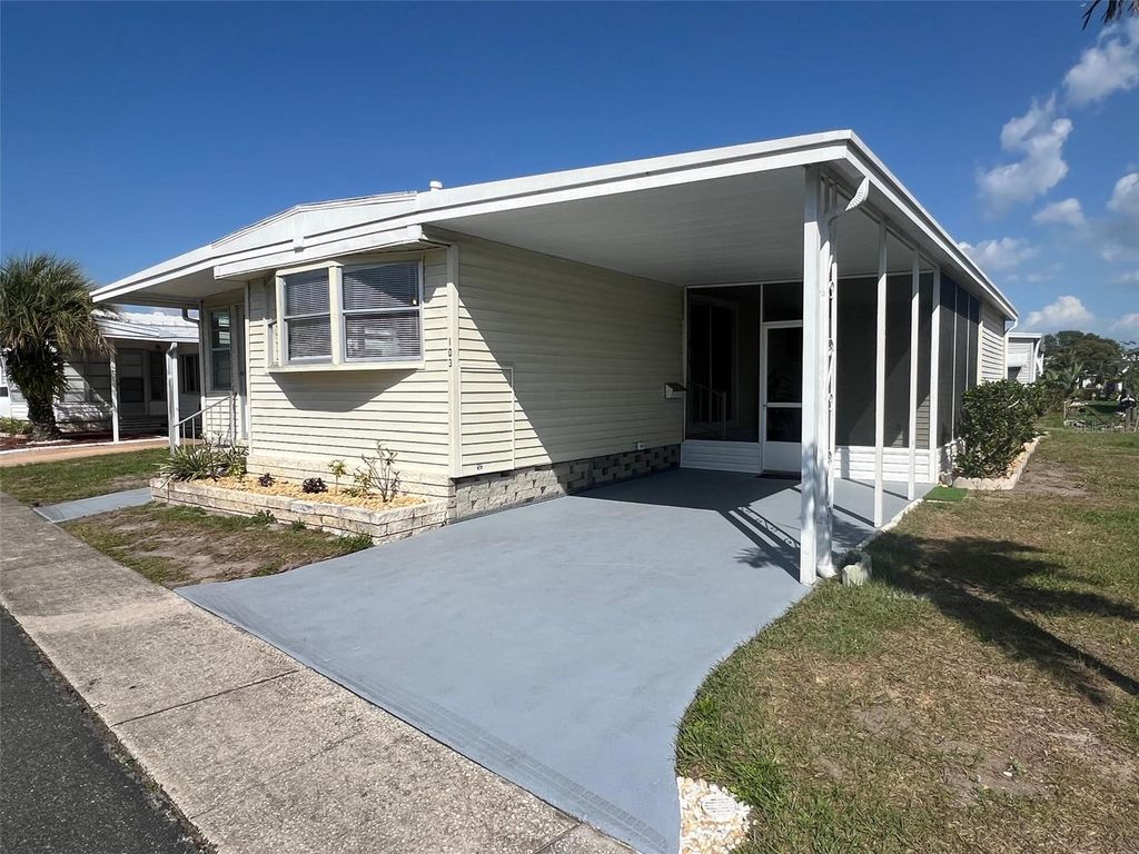 Photo of 103 Pindo Palm Street W, Largo, FL 33770 (MLS # TB8485756)