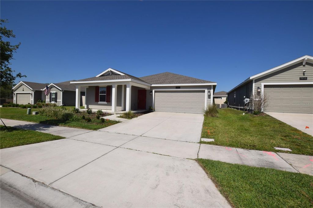 Photo of 1990 Cricket Cradle Drive, Kissimmee, FL 34746 (MLS # O6405443)
