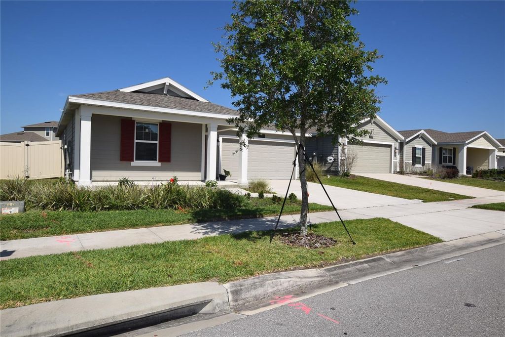 Photo of 1990 Cricket Cradle Drive, Kissimmee, FL 34746 (MLS # O6405443)