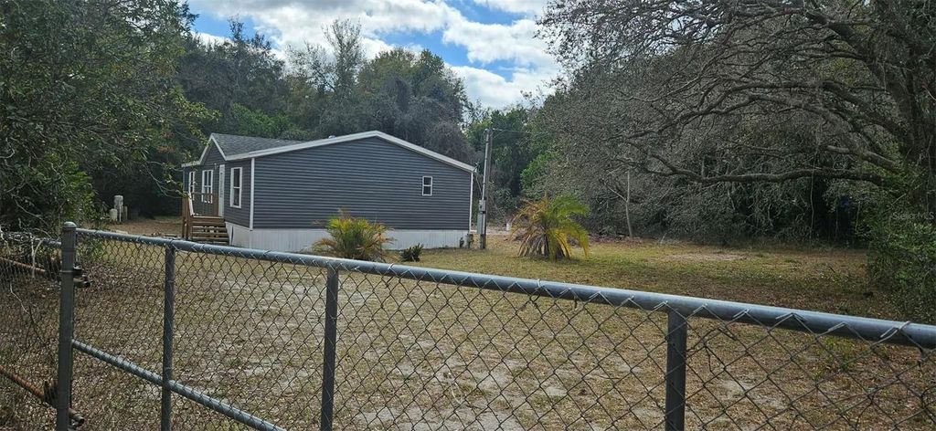 Photo of 13535 Grandville Avenue, Hudson, FL 34669 (MLS # TB8484521)