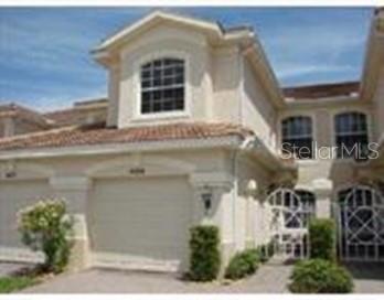 Immaculate three bedroom, two bath condo on second floor in Arielle. Brand new carpeting, open floor plan with large rooms. Sliders open up to lanai that overlooks the pool. A must see! $100 association application fee
