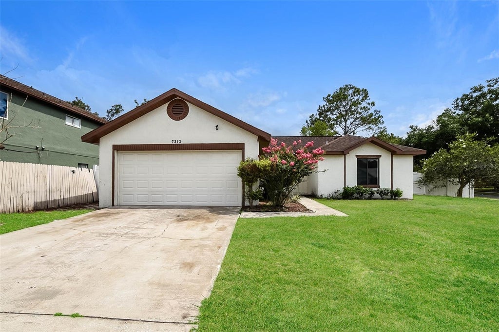 Photo of 7313 Radiant Circle, Orlando, FL 32810 (MLS # O6414212)