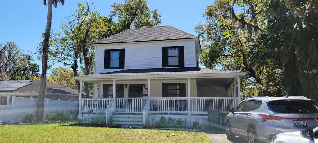 Photo of 416 W Howry Ave, Deland, FL 32720 (MLS # V4947506)