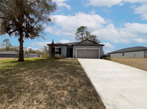 Photo of 19642 SW 82nd Loop, Dunnellon, FL 34432 (MLS # O6388618)