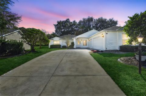 4936 SAWGRASS LAKE CIRCLE LEESBURG FL 34748