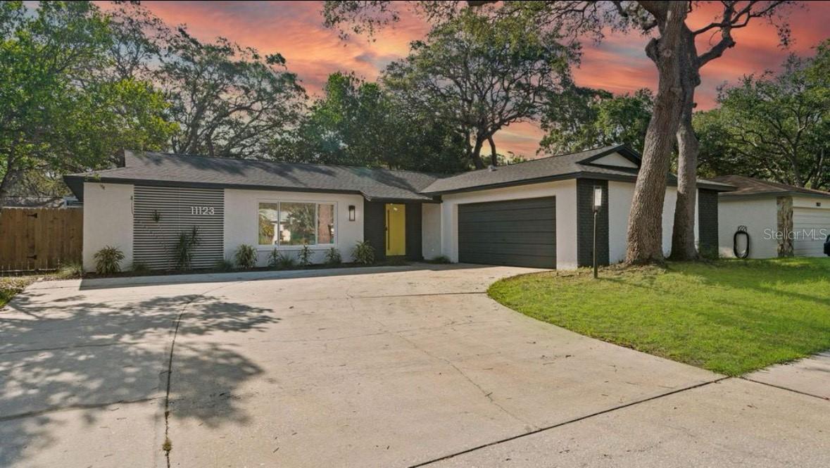 Fully furnished 3 bedroom, 2 bathroom home available for rent in a quiet no outlet neighborhood with direct access to Walsingham Park. This renovated home combines modern style with comfort, featuring an open split bedroom layout, quartz countertops, stainless steel appliances, and luxury vinyl plank flooring throughout. The living area includes an electric fireplace and designer details, while the primary suite offers a spacious retreat with double vanity and ample closet space.
Step outside to your private backyard oasis with a screened-in pool, hot tub, covered patio, and beautifully landscaped grounds. Lawn maintenance is included, making it easy to enjoy the outdoor living space year round. Additional features include impact windows, new roof, updated systems, and an oversized 2 car garage with laundry and storage. Conveniently located near beaches, shopping, dining, and airports.